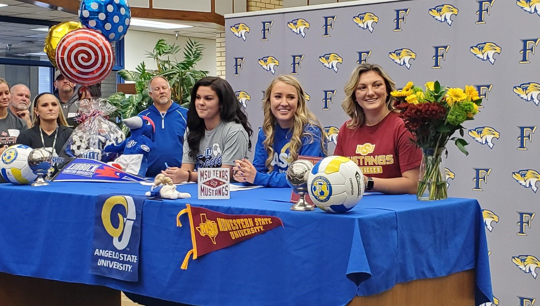 soccer players sign to play at various colleges